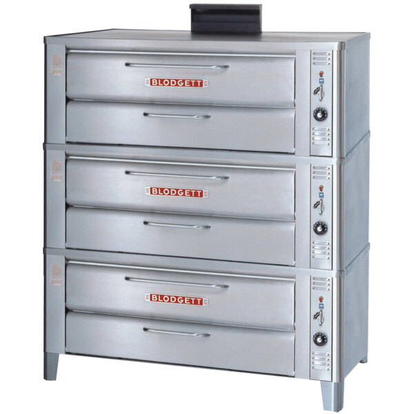A stainless steel Blodgett triple deck oven with a metal draft diverter.