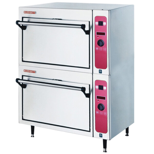 A white Blodgett electric countertop double deck oven with pink accents and metal drawers.