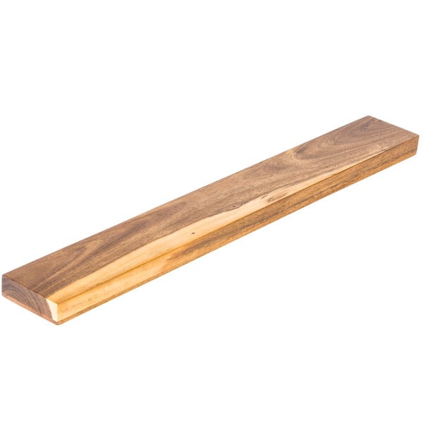 A long, thin acacia wood strip.