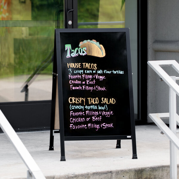 A black Aarco A-Frame sign board with colorful writing for a Mexican restaurant menu.