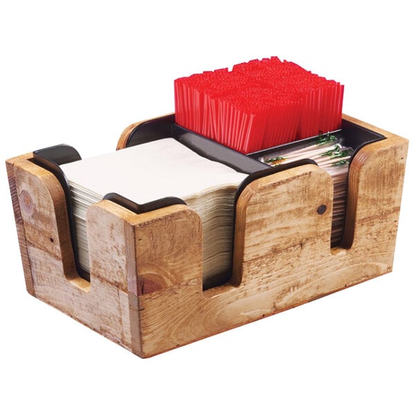 A wooden Cal-Mil Madera bar caddy with napkins and red straws.