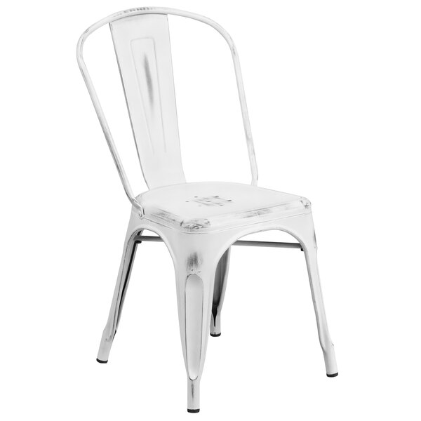 A Flash Furniture distressed white metal chair with a metal back.