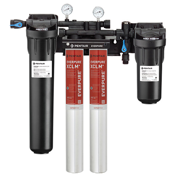 A black water filter system with white labels on the cylinders.