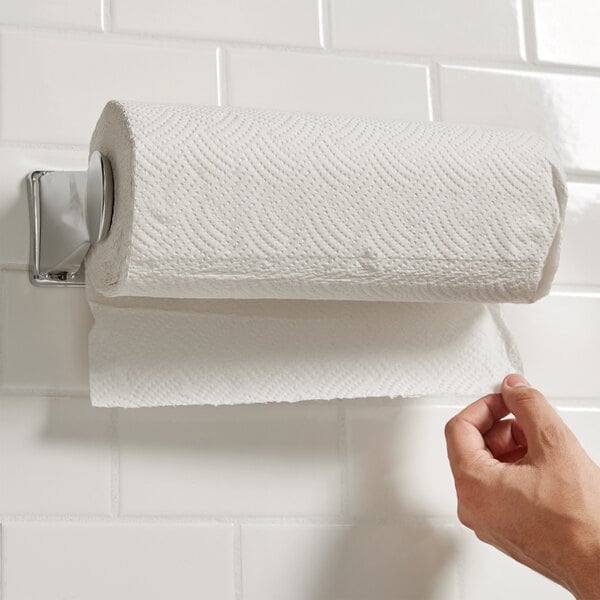 A hand pulling a sheet from an Elegant 2-Ply Paper Towel roll.