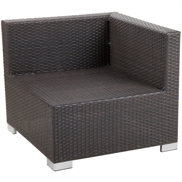 A brown wicker BFM Seating Aruba armchair with silver legs.