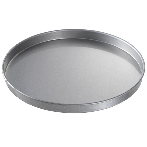 A Chicago Metallic aluminized steel round cake / pizza pan with a silver surface.
