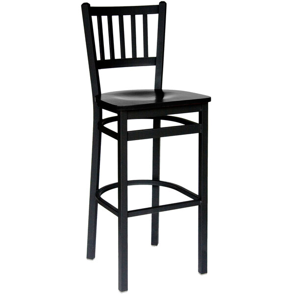 A BFM Seating black metal bar chair with a wooden seat and backrest.