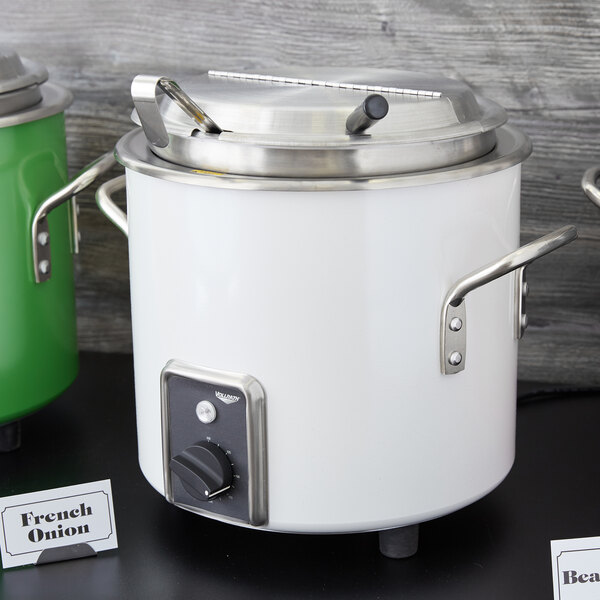 A white Vollrath stock pot with a lid.