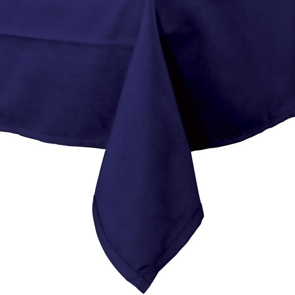 A navy blue Intedge rectangular table cover with a folded edge on a table.