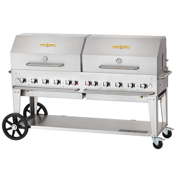 A large stainless steel Crown Verity mobile outdoor grill with two burners and wheels.