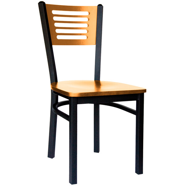 A BFM Seating black metal side chair with a natural wooden back and seat.