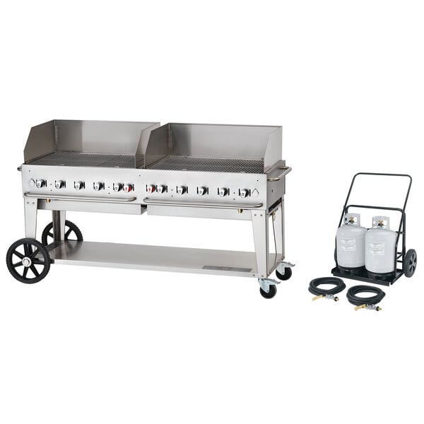 A large stainless steel Crown Verity cart grill with 2 propane cylinders.