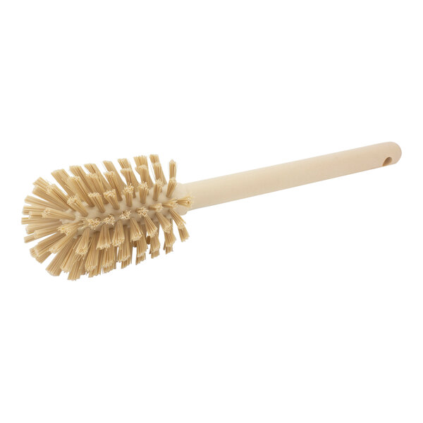 A Carlisle Sparta Spectrum tan bottle cleaning brush with a white handle.