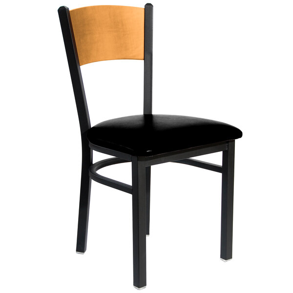 A black metal side chair with a natural wooden seat and back.