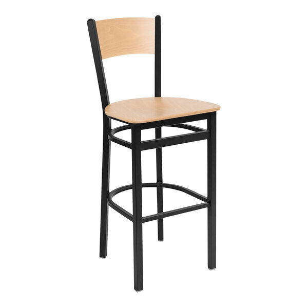 A BFM Seating black metal bar stool with a natural wood back and seat.