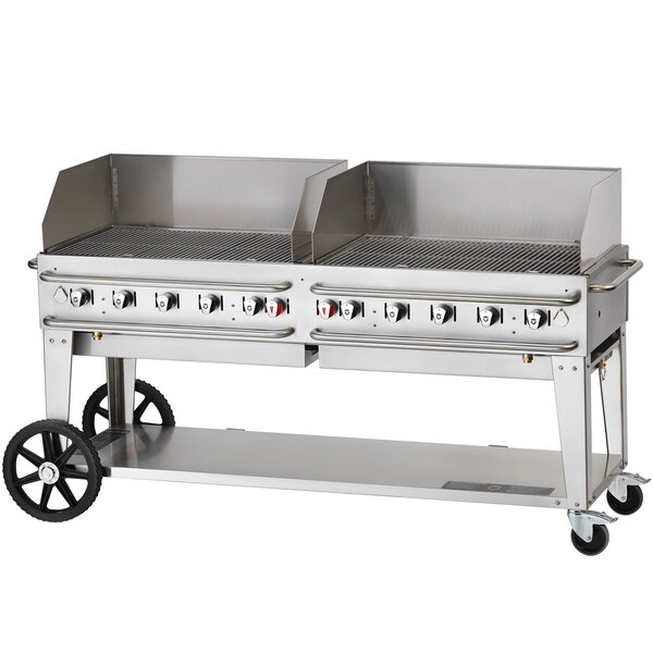 A large stainless steel Crown Verity outdoor rental grill on wheels.