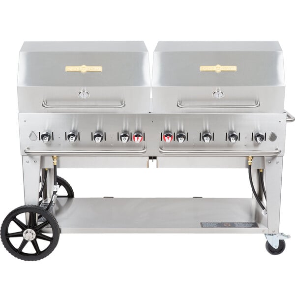A large silver Crown Verity liquid propane grill on wheels.