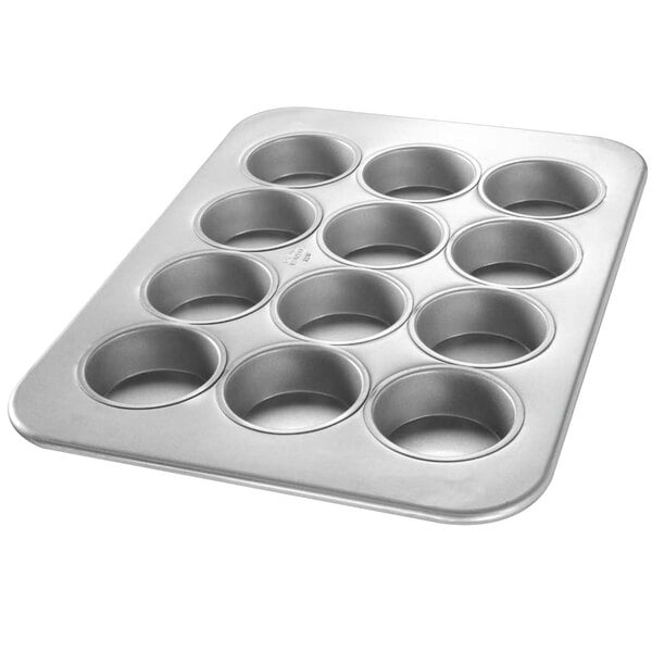 A silver Chicago Metallic jumbo muffin pan with 6 cupcake holes.