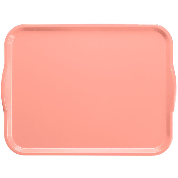 A blush pink rectangular fiberglass Cambro tray with white handles.
