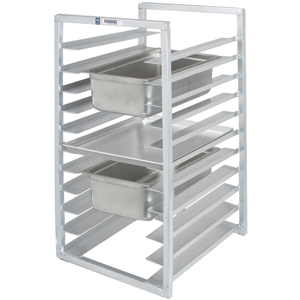 A Channel RIUTR-10 sheet pan rack with metal trays on it.
