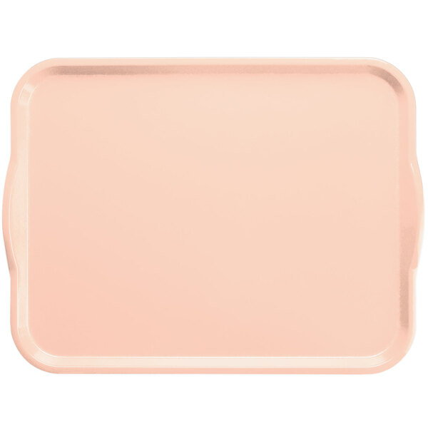 A light peach rectangular Cambro tray with handles.