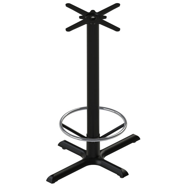 A black FLAT Tech cast iron bar height table base with a foot ring.