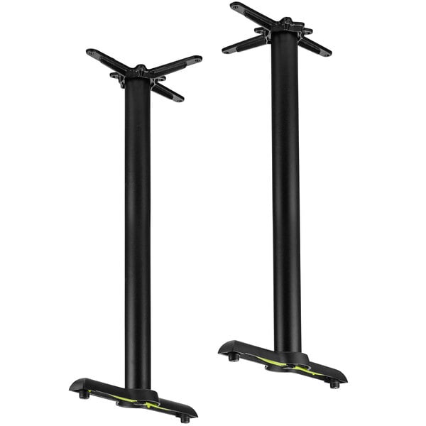 A set of two black FLAT Tech bar height table bases with a black base.