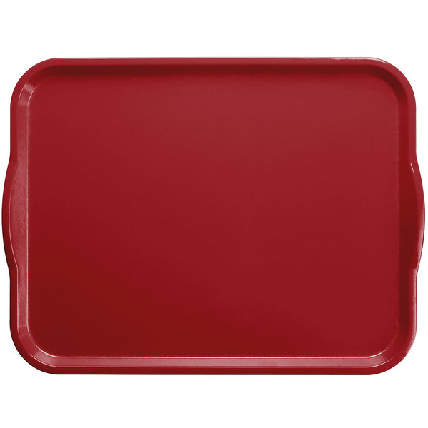 A Cambro cherry red rectangular fiberglass Camtray with handles.