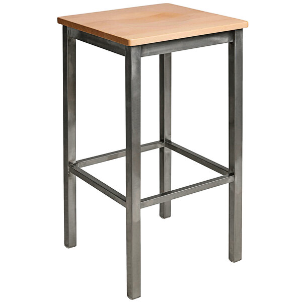 A BFM Seating metal bar stool with a natural wood seat.