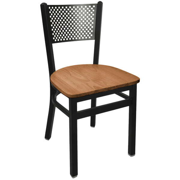 A BFM Seating black steel side chair with a wooden seat.
