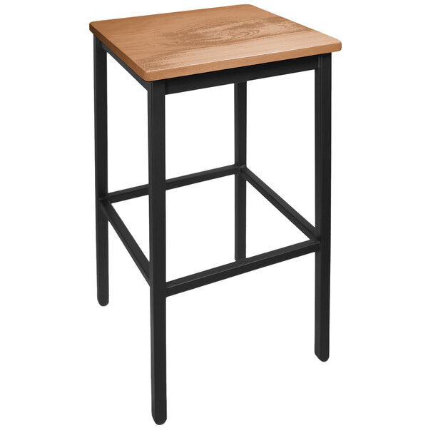 A BFM Seating black steel bar stool with an ash wood seat.