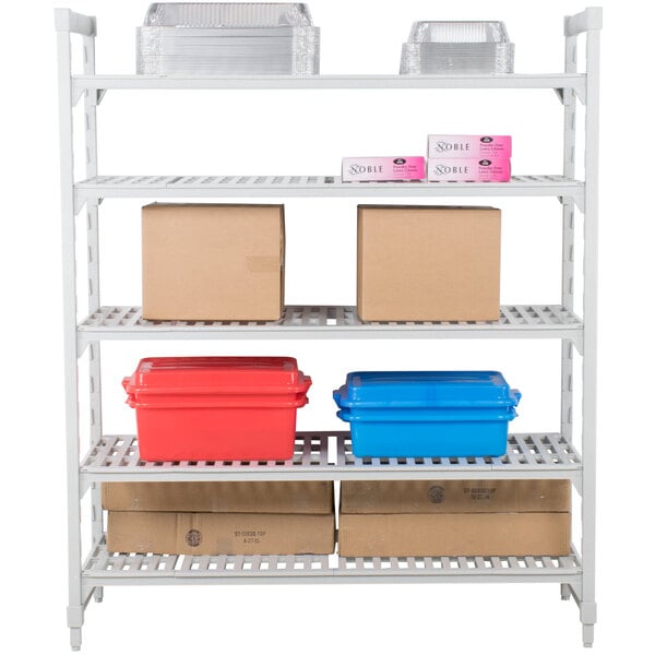 A white Cambro Camshelving® Premium shelving unit with 5 vented shelves holding boxes and plastic containers.