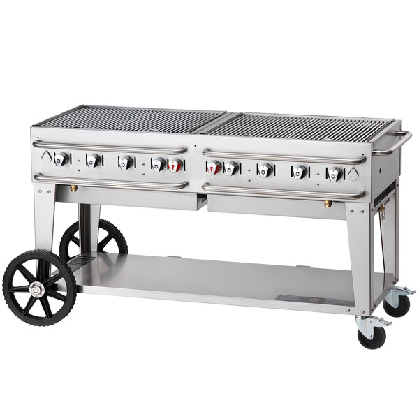 A large stainless steel Crown Verity portable grill on wheels.