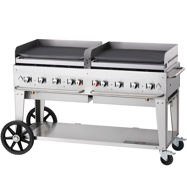 A Crown Verity portable outdoor griddle with two burners on a cart.