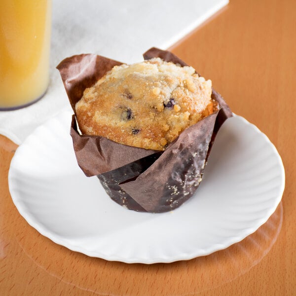 An American Metalcraft melamine plate with a muffin on it.