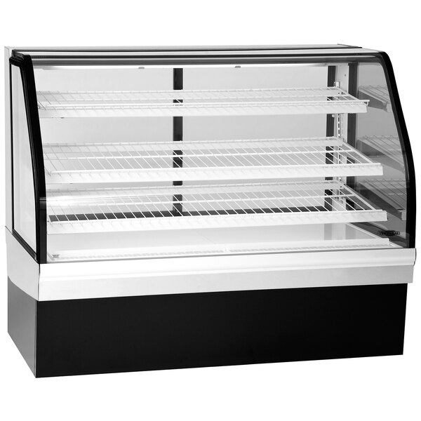 A white Federal Industries refrigerated bakery display case with curved glass shelves.
