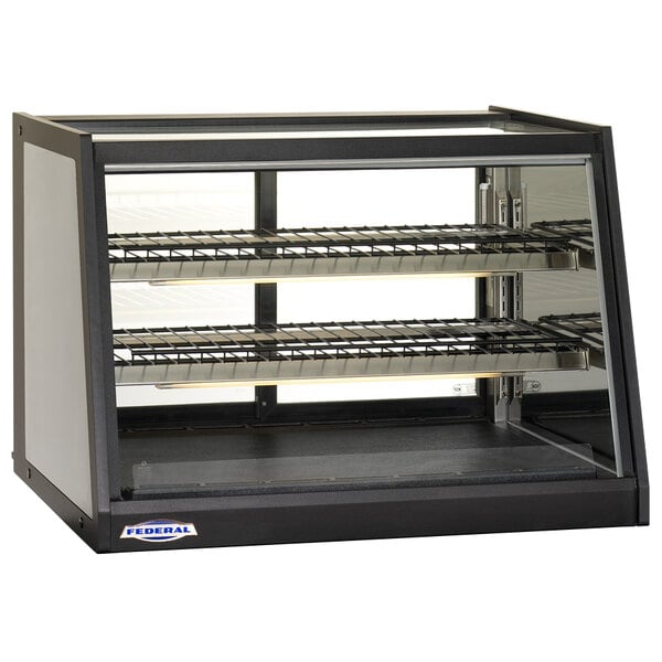 A black and silver Federal Industries countertop heated display case with a glass door.