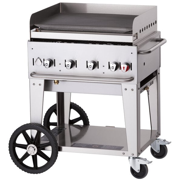 A Crown Verity natural gas outdoor griddle on a cart with wheels and a stainless steel top.