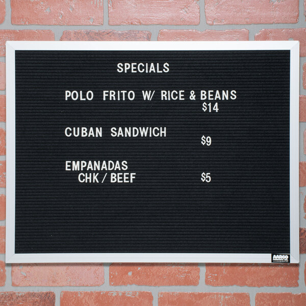 An Aarco black felt message board with white text reading "Specials"