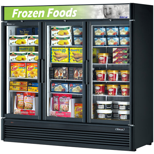 A Turbo Air glass door merchandising freezer full of frozen foods.