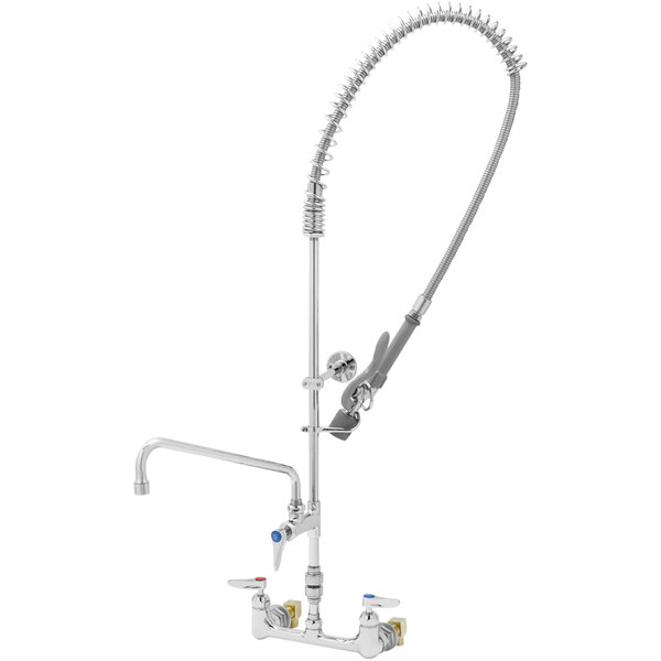 A T&S wall mounted pre-rinse faucet with hose and sprayer.