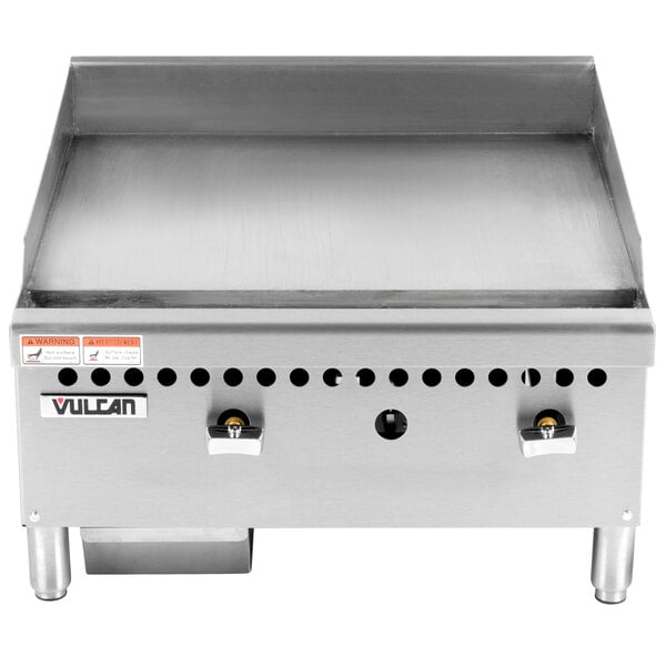 A Vulcan stainless steel countertop griddle with manual controls.