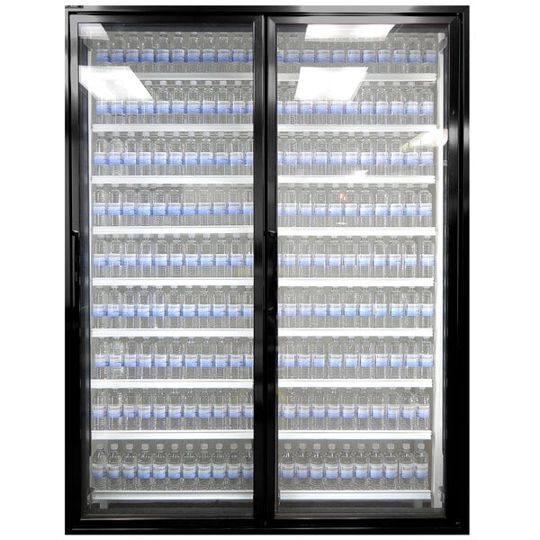 Styleline Classic Plus glass walk-in cooler doors with shelving filled with water bottles.