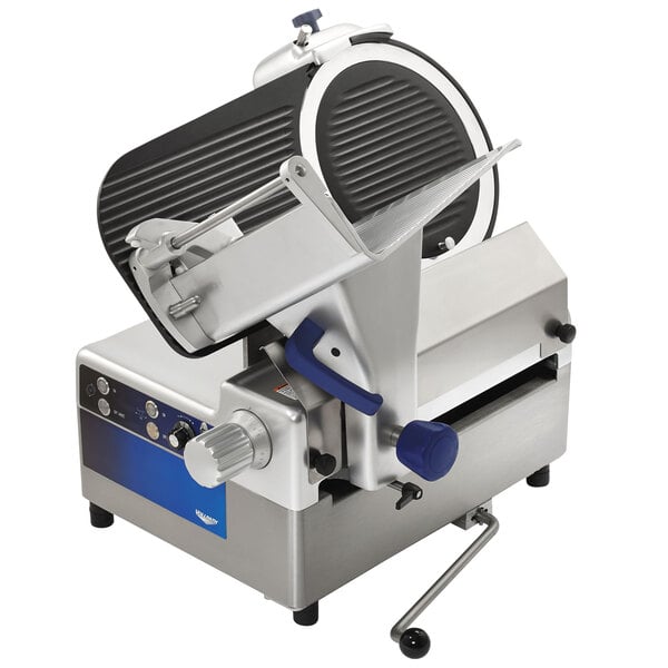 A Vollrath heavy duty meat slicer with a circular blade.