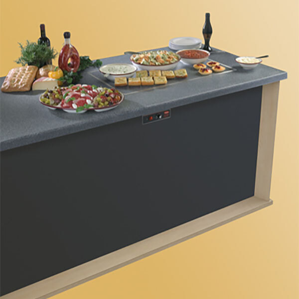 A Hatco heated shelf built into a counter with food on it.