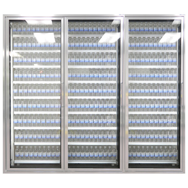 Styleline walk-in cooler merchandiser doors with shelving filled with many bottles of water.