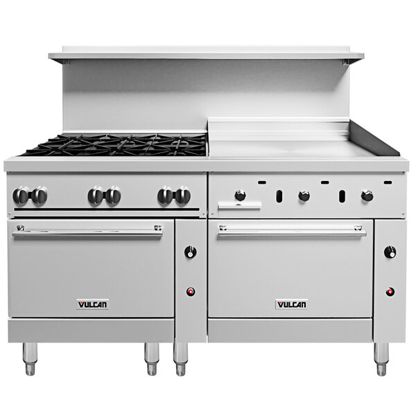 A white Vulcan commercial range with black knobs and two ovens.