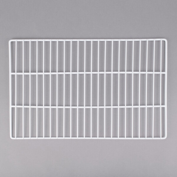 A white coated wire grid shelf for an Avantco back bar refrigerator.