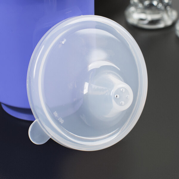 A clear plastic lid on a plastic cup.