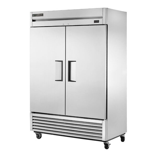A stainless steel True reach-in freezer with two solid doors.